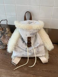Faux suede hoodie-style backpack with marble print and cozy sherpa fleece trim