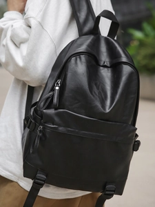Classic vintage black leather backpack with front zipper pocket for casual commute