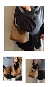 Detail of dark brown lychee textured leather tote bag and matching inner pouch set