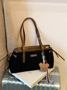 Retro black faux suede tote bag with brown leather straps and a cute teddy bear charm