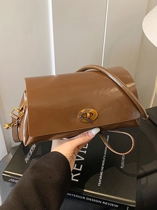 Retro brown gloss leather underarm bag with gold oval twist lock for women's fashion
