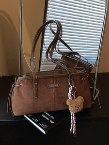 Vintage dark brown faux suede shoulder bag with teddy bear pendant and metal logo