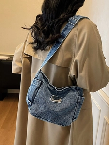 Retro blue washed denim tote bag with metal plaque and adjustable wide shoulder strap