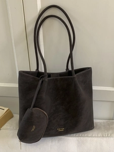 Bolso tote grande de cuero con logo PAN'TOR LONDON y estuche pequeño con cremallera