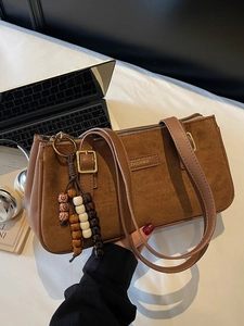 Retro brown suede underarm bag with double straps and stylish wooden bead tassel charm