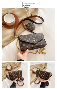 Detail of coffee brown monogram crossbody bag with small coin purse and chain strap