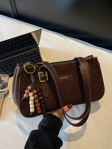 Retro dark brown suede underarm bag with decorative beads for stylish office commuting