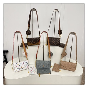 Three-piece crossbody bag set with monogram pattern including coin purse and round pouch