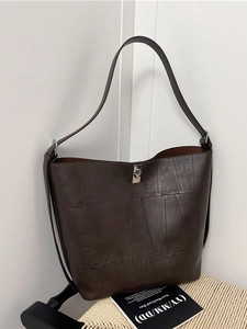 Retro dark brown large tote bag in textured faux leather with silver buckle and shoulder strap