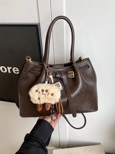 Dark brown PU leather bucket tote bag with round handles and plush cloud charm