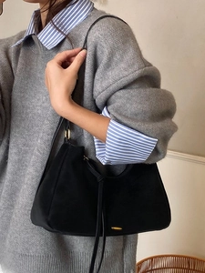 Classic black suede hobo bag for women with gold hardware and stylish leather shoulder strap