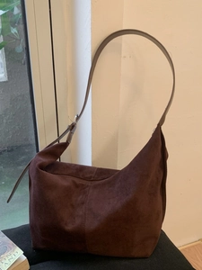 Minimalist large brown suede hobo tote bag with adjustable leather strap for women