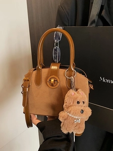 Retro faux suede shell bag in brown with metal lock and cute plush dog pendant charm