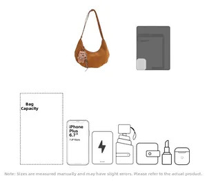 Sac hobo marron montrant sa grande capacité pour téléphone et objets du quotidien