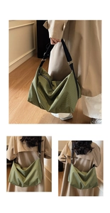 Detail of green checkered tote bag showing soft fabric texture and adjustable strap