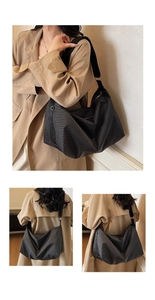 Detailed view of the large checkered tote bag showing the textured black and white pattern