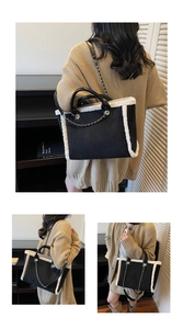 Detailed view of bicolor tote bag with suede finish and soft faux fur trimming accents