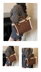 Detail of a brown suede tote bag featuring white faux shearling trim and gold chain accents