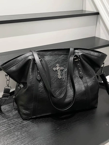 Vintage black tote bag with silver cross charm and punk style metal chain details