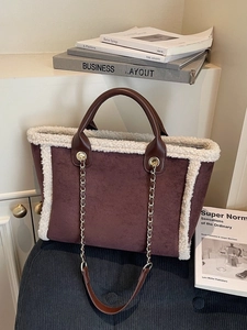 Large dark brown suede tote bag with white faux shearling trim and gold chain strap
