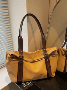 Minimalist large-capacity ginger canvas tote bag with dark brown leather straps for women