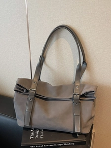 Minimalist large capacity dark grey tote bag with buckle details and dual shoulder straps