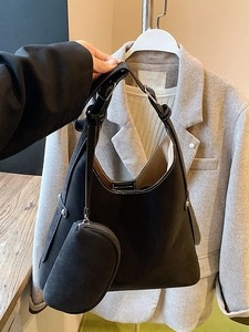 Retro black matte tote bag with white contrast stitching and adjustable shoulder strap
