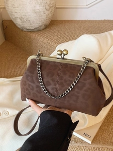 Vintage leopard shell bag with bronze kiss-lock and metal chain strap for women