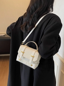 Chic beige crossbody square bag with gold hardware and top handle for women