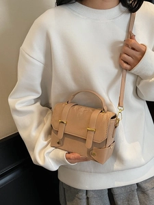 Retro light brown leather crossbody bag with top handle and gold buckles for women