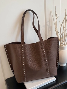 Brown leopard print tote bag with silver metal rivets and large capacity shoulder handles