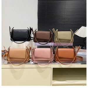 Detailed display of fashionable leather crossbody bags in six colors with asymmetric flaps
