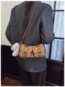 Retro camel suede shoulder bag with brown leather trim and golden buckle pockets