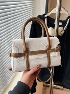 Elegant white and brown two-tone top handle crossbody bag with litchi grain texture