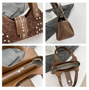 Detail view of leopard print handbag featuring silver studs and internal zip pocket