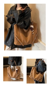 Detail view of large brown PU leather tote bag with decorative straps and plush glove charm