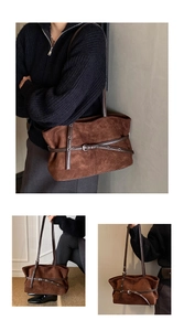 Détail du sac cabas vintage marron café avec sangles en cuir et œillets métalliques