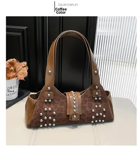 Detail of coffee brown leopard print shoulder bag with silver stud accents and matte finish