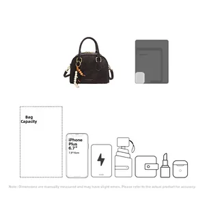 Interior capacity of vintage crossbody bag showing phone, power bank and cosmetics