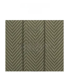 Close-up of green herringbone woven fabric texture showing fine fiber detail