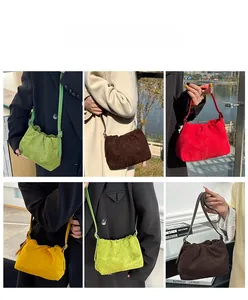 Detailed views of ruched cloud crossbody bags in multiple colors with adjustable straps