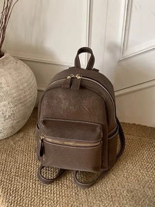 Vintage dark brown suede mini backpack with contrast stitching and gold metal zippers