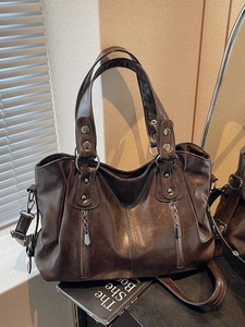 Retro dark brown PU leather tote bag with rivets and adjustable shoulder straps