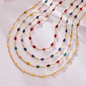 Colorful enamel oval link necklaces in bright gold finish for a vibrant dopamine style