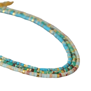 Three-layer bohemian beaded necklace with ocean blue and green stones and gold metal accents