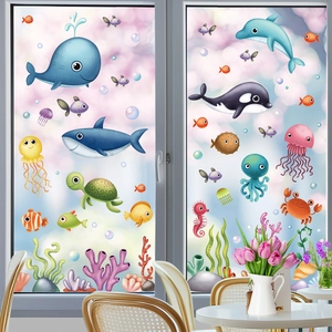 Vibrant cartoon marine life window decals showing whales and turtles on glass surface