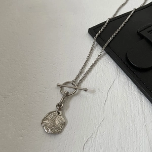 Modern S925 sterling silver necklace with irregular lava pendant and chic OT toggle clasp