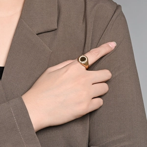 Gold plated titanium steel signet ring with black enamel center and pavé zircon stones