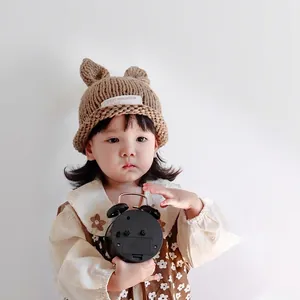 Handmade brown knit baby beanie with cute bear ears and C'EST BEAUCOUP label