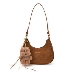 Caramel suede crescent shoulder bag with adjustable strap and plush dog keychain charm